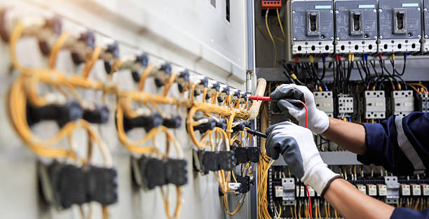 Professional Electrician technician working in Deatsville, AL